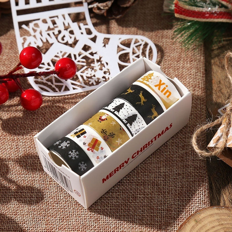 Washi -tape met kerstthema en kerstcadeau -inpaktape