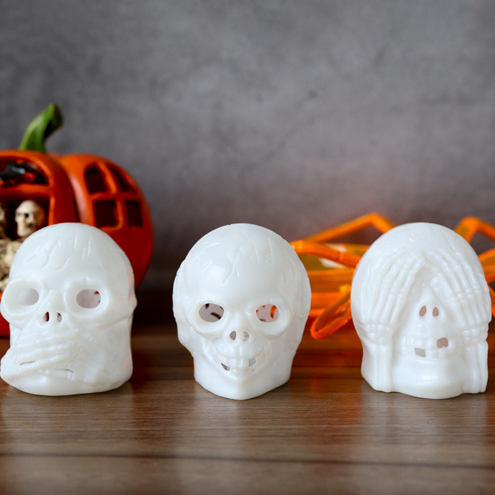 Hear No Evil, See No Evil, Speak No Evil Black Skulls with Lighted Eyes