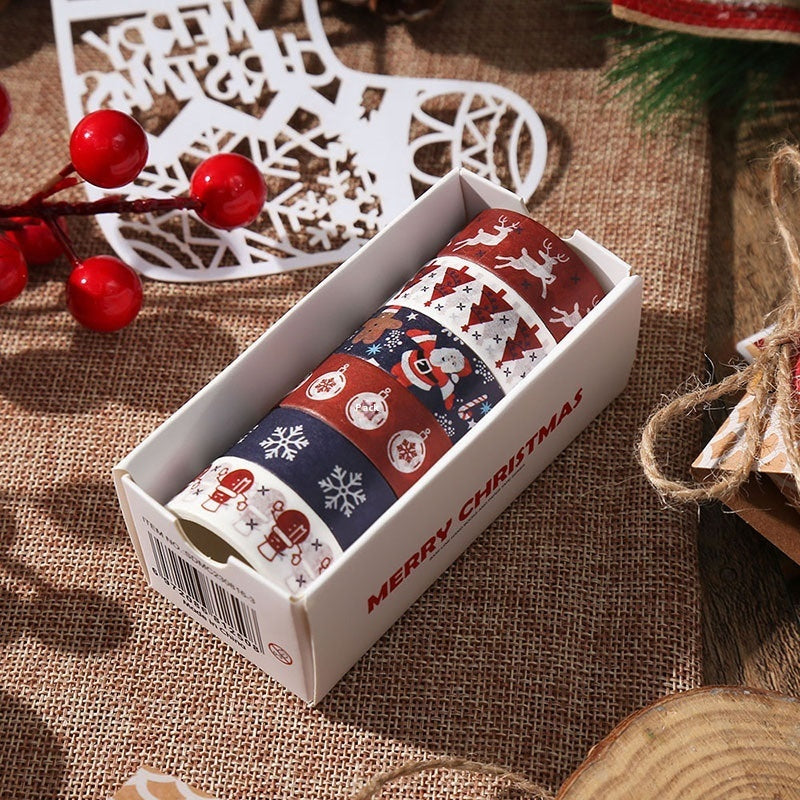 Washi -tape met kerstthema en kerstcadeau -inpaktape