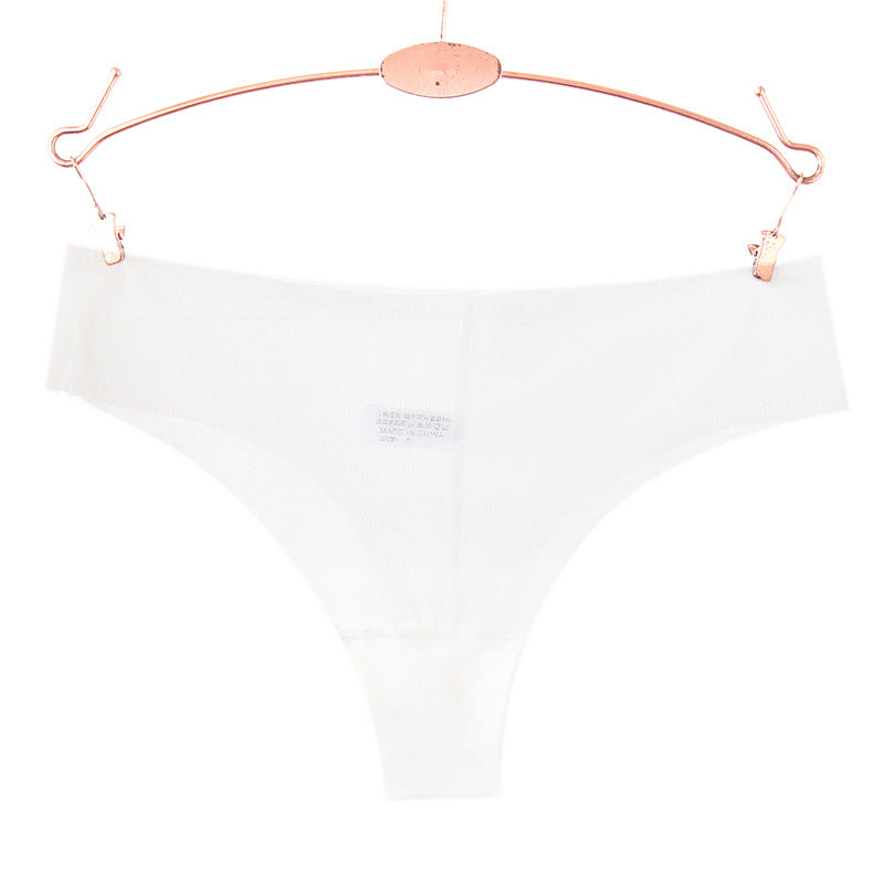 Panty string en maille transparente du bord brut