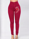 赤い花刺繍のスキニージーンズ